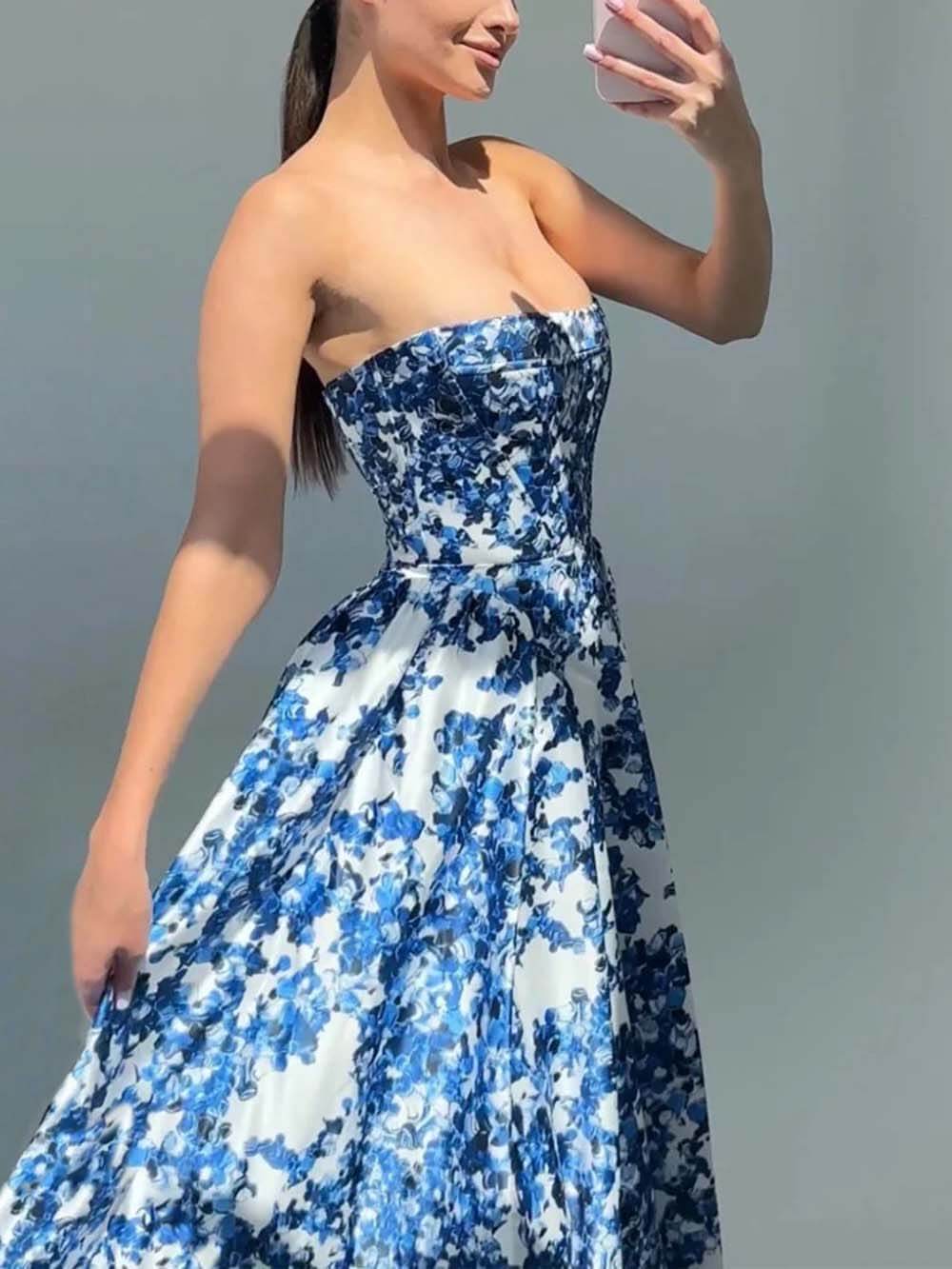 Elegante strapless string maxi-jurk met print