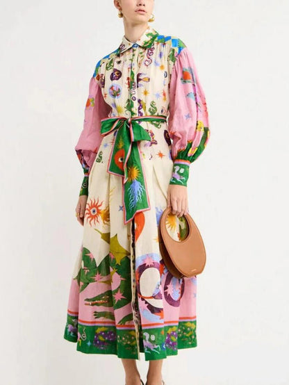 Unieke en mooie midi-jurk in shirtstijl met retroprint en lange mouwen