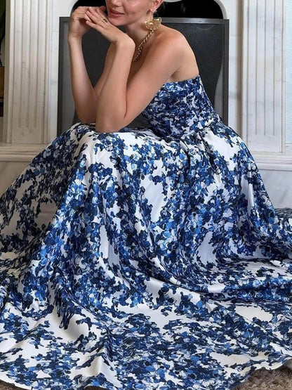 Elegante strapless string maxi-jurk met print