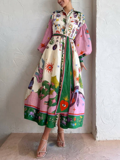 Unieke en mooie midi-jurk in shirtstijl met retroprint en lange mouwen