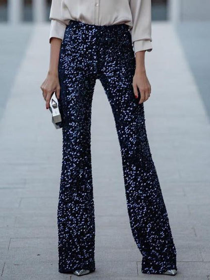 Elegante, met pailletten versierde, uitlopende broek